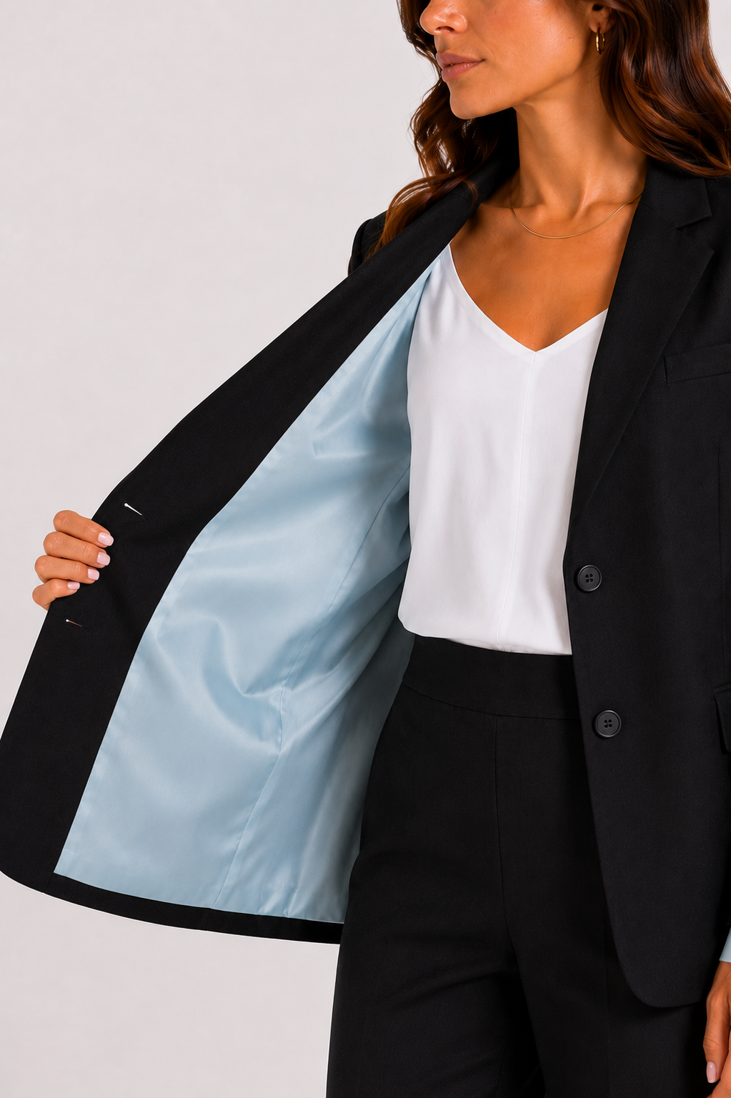 Wool blazer in grey with belt and exposed light blue lining on the sleeves