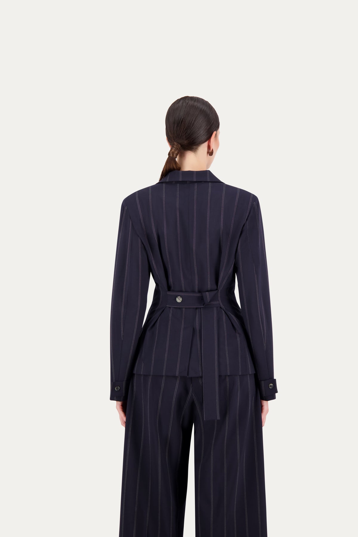 Princess-cut wool blazer with adjustable back belt in blue pinstripe