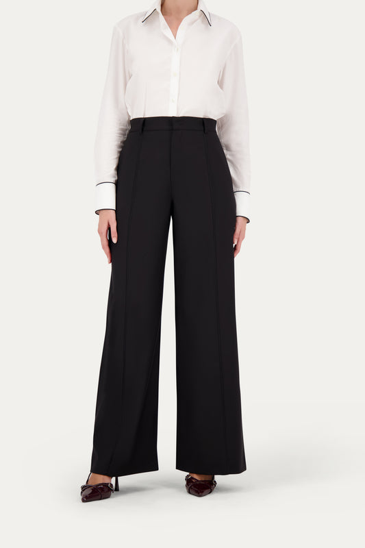 Pantalone sartoriale dritto in fresco lana nero con piping tono su tono